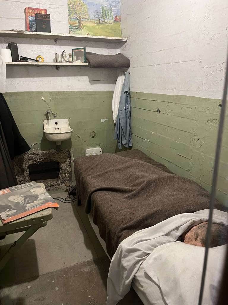 A view of inside a cell, where a dummy head is seen in a bed of one of the escaped prisoners at Al-Catraz.
